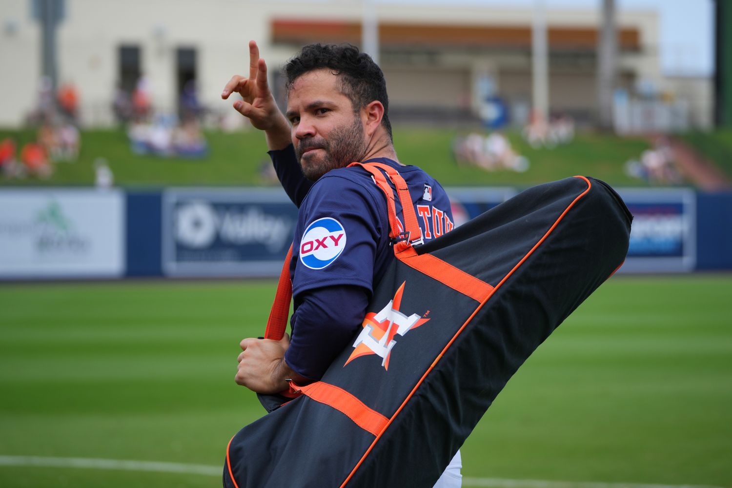Mar 9, 2024; West Palm Beach, Florida, USA; Houston Astros second baseman Jose Altuve (27) waives to fans as he heads to the training facility midway through the game against the Washington Nationals at CACTI Park of the Palm Beaches.